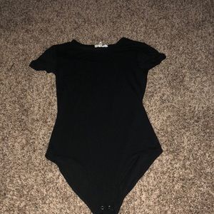 black shirt sleeve body suit!